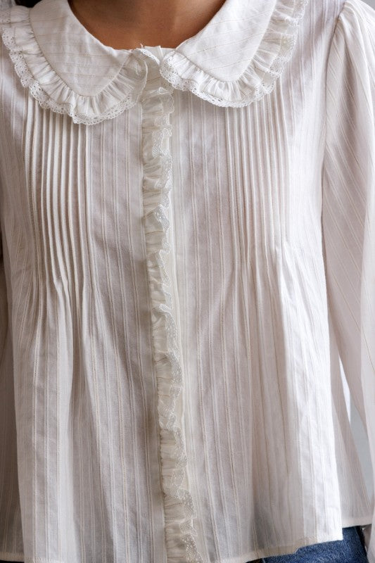 The Ivory Ruffle Blouse