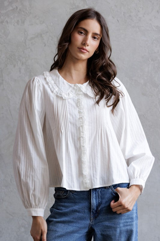 The Ivory Ruffle Blouse